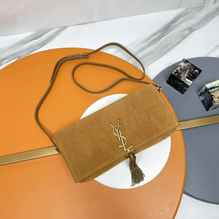 View 1 of Camel Suede Crossbody Bag with Gold YSL Emblem - Tassel Detail