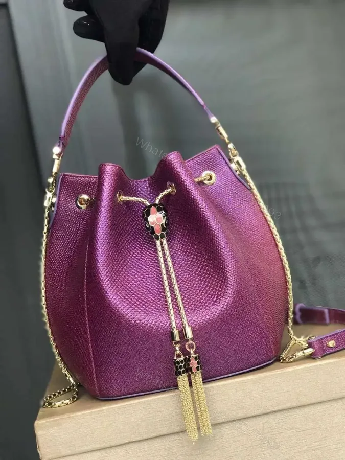 View 1 of Design Serpenti Forever Bucket Bag 18cm in Karung Skin – Dubai Fashion LUX