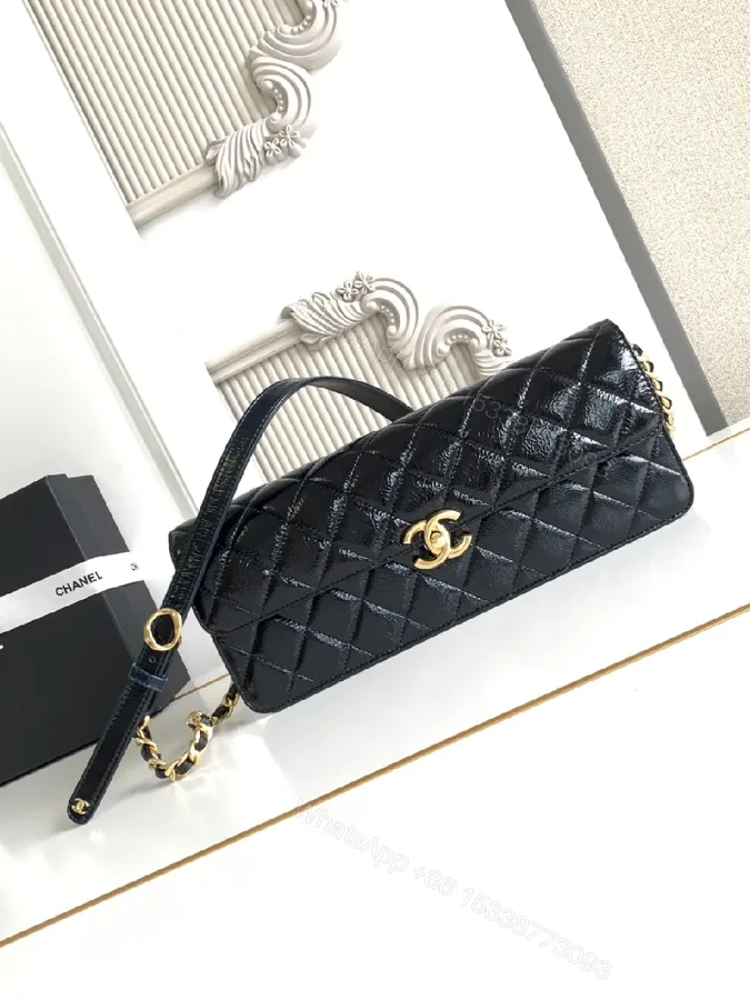 View 1 of Quilted Black Bag with Gold Hardware, Compact Shoulder Style