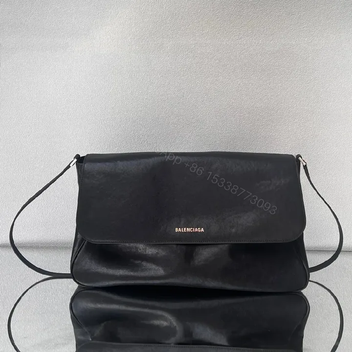 View 1 of Compact Black Leather Crossbody: Subtle Luxe, Minimal Hardware