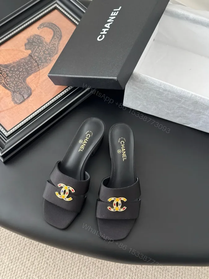 View 1 of Chanel Women Black Fabric Mules With Embellishment