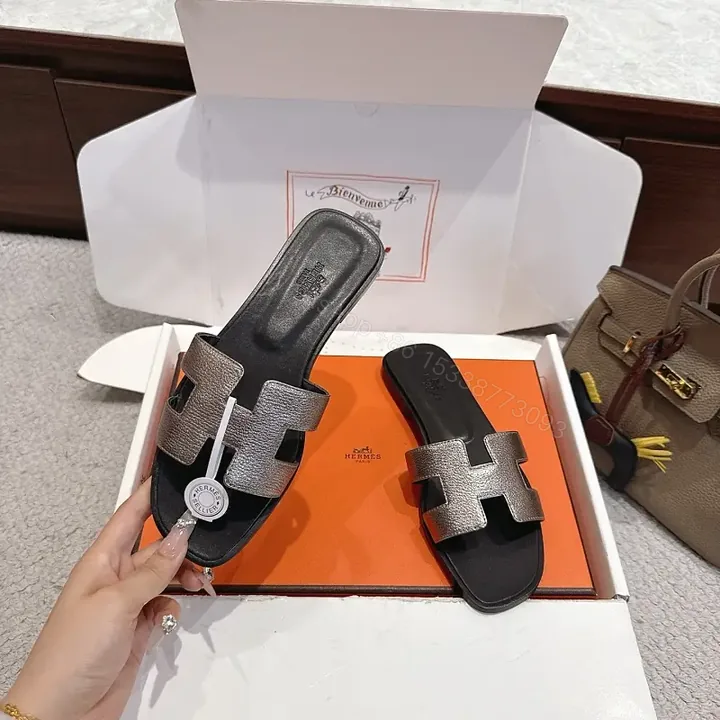 View 1 of Silver Hermès-Style H Sandals, Metallic Strappy Slide, Luxury Open Toe Slide