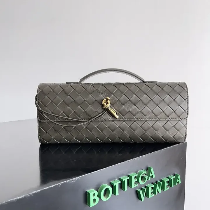 View 1 of Compact Woven Leather Wallet with Gold Clasp - Everyday Luxury