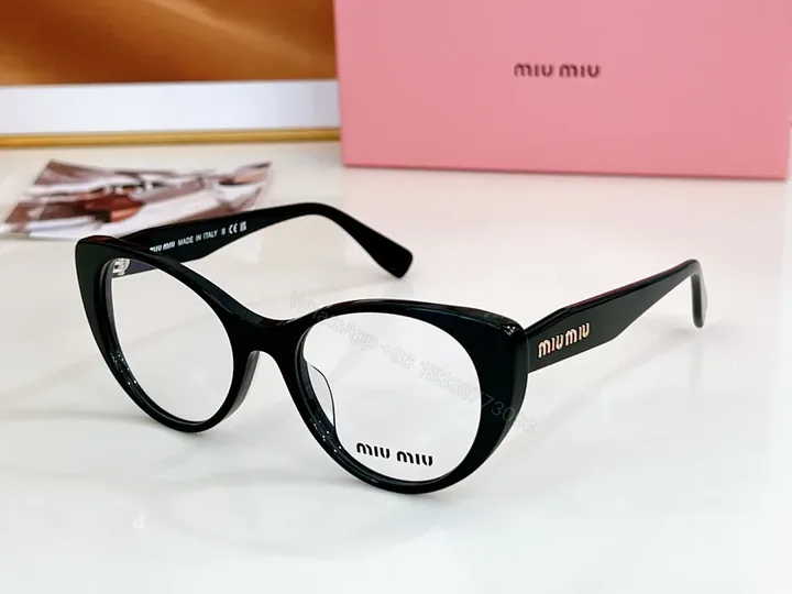 View 1 of Miu Miu Black Cat-Eye Eyewear: Everyday Luxury