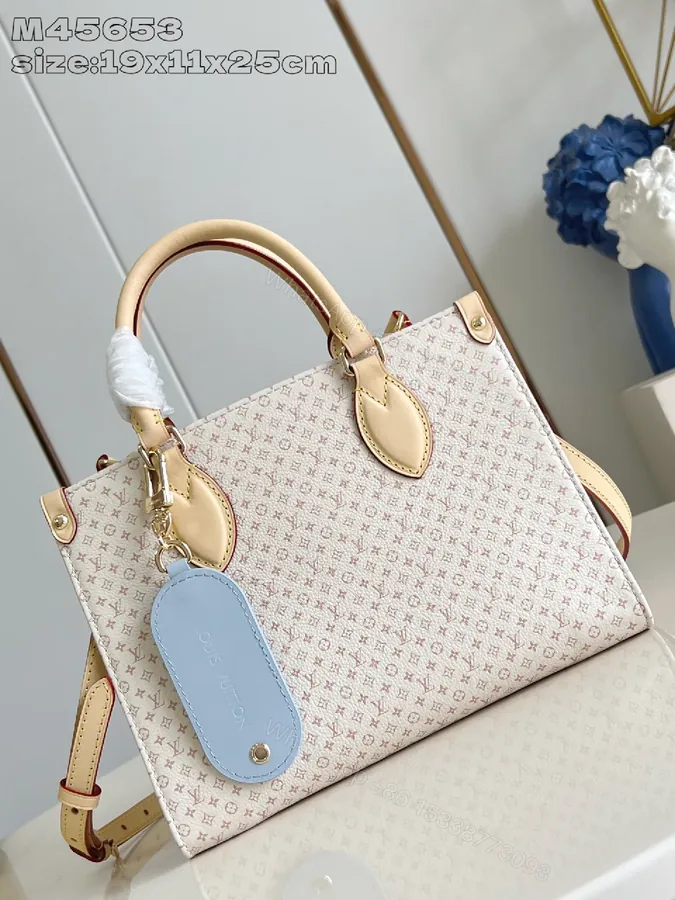 View 1 of Soft Monogram Tote: Luxe Monogram Canvas Tote with Leather Details