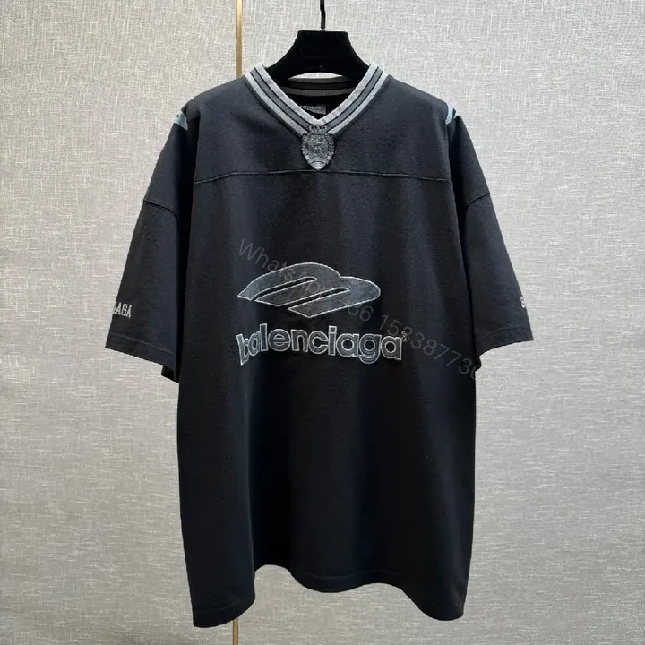 View 1 of Bold Logo Knit: Oversized Streetwear with Hardware Details