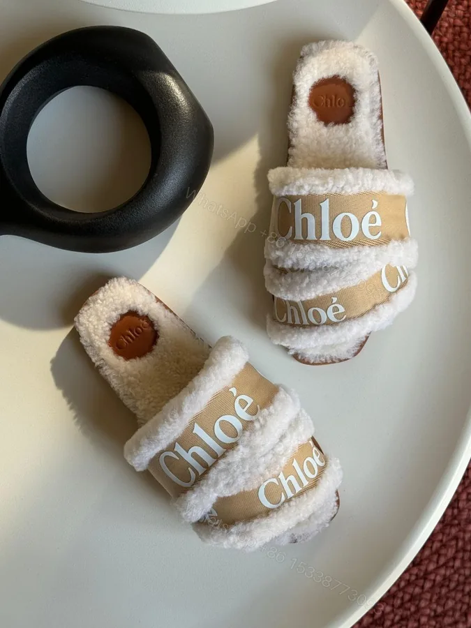 View 1 of Chloé Marcie faux fur mules & clogs