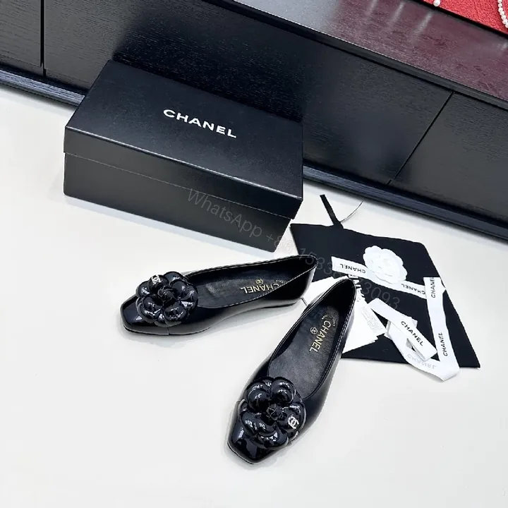 View 1 of Glossy Patent Ballet Flats with Floral Embellishments