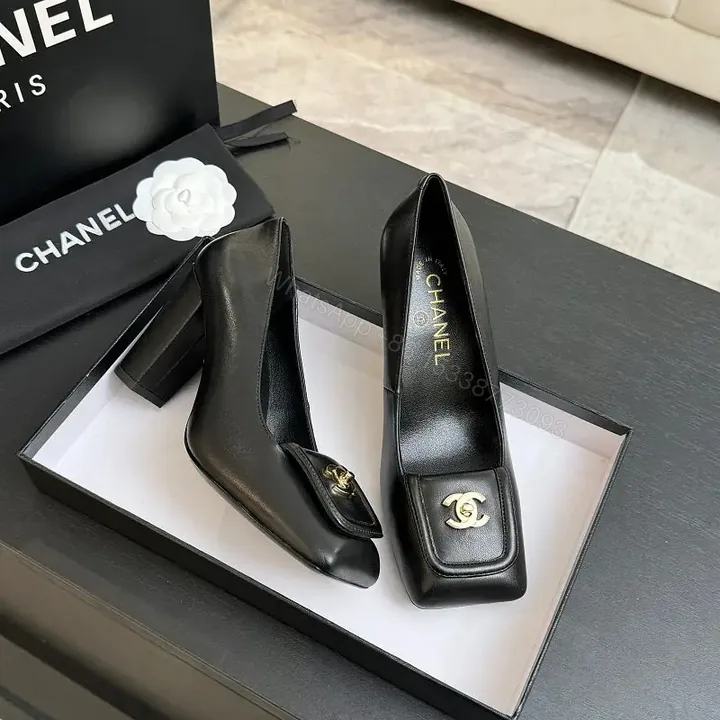 View 1 of Black Leather Heels with Iconic Hardware Emblem, Square-Toe, Block Heel