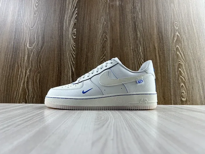 View 1 of White/Blue Premium Leather Air Force 1 Low - Minimal Luxe Sneakers