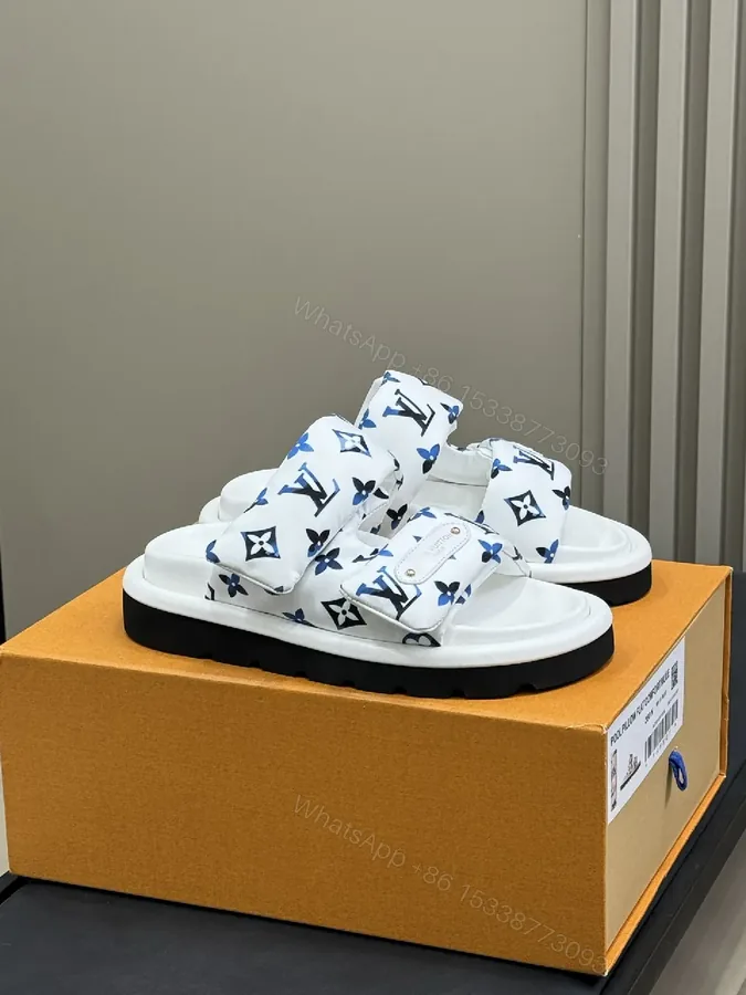View 1 of Monogram-Pattern White Slip-Ons with Signature Logo