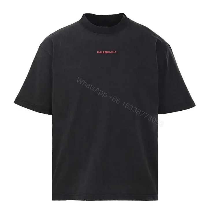 View 1 of Minimalist Black Cotton Tee with Subtle Red Embroidery