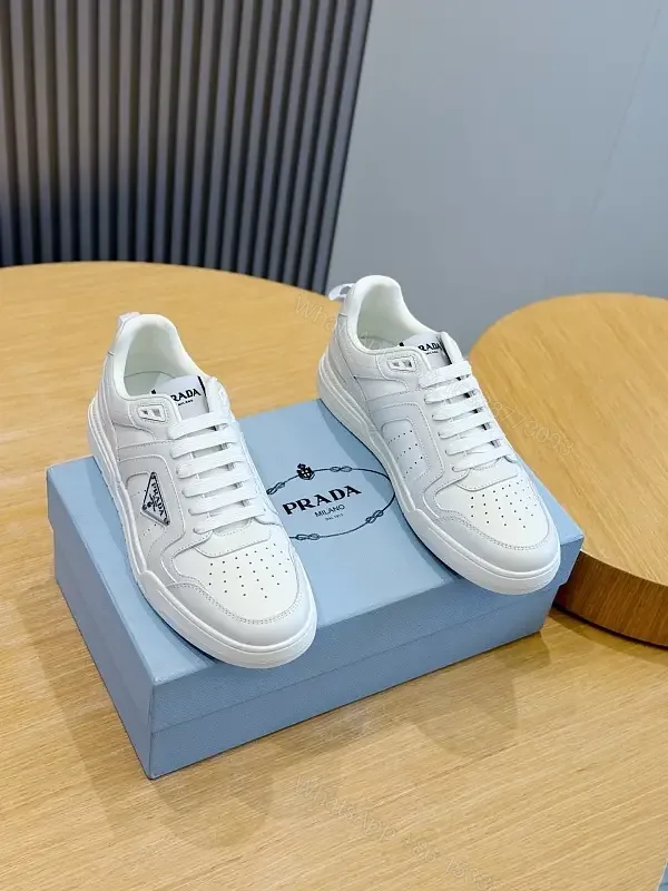 View 1 of White Leather Sneakers Minimalist Cushioning Prada Style Sneakers