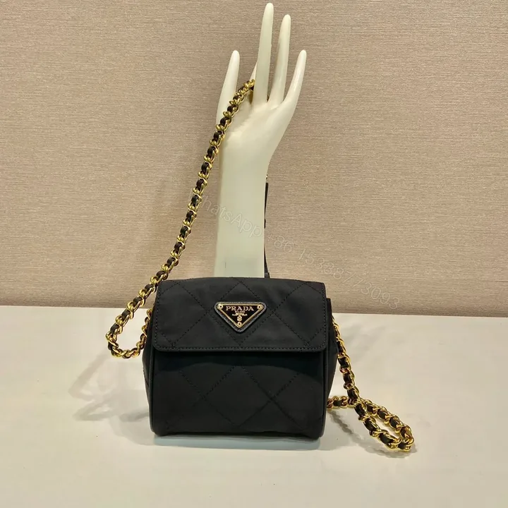 View 1 of MINI QUILTED FLAP BAG 14 IN BLACK RE-NYLON FABRIC GOLD CHAIN