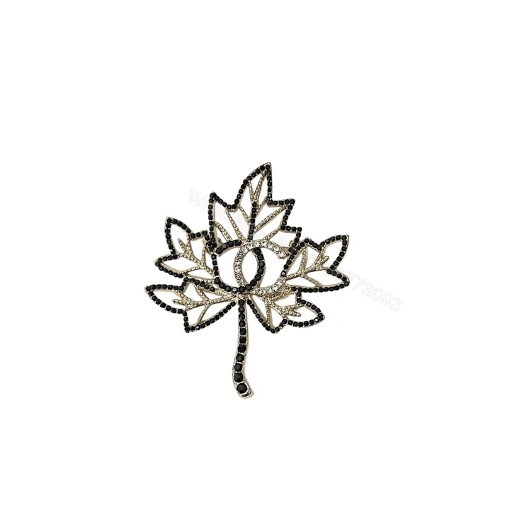 View 1 of Chanel Cc Leaf Brooch Black Gold