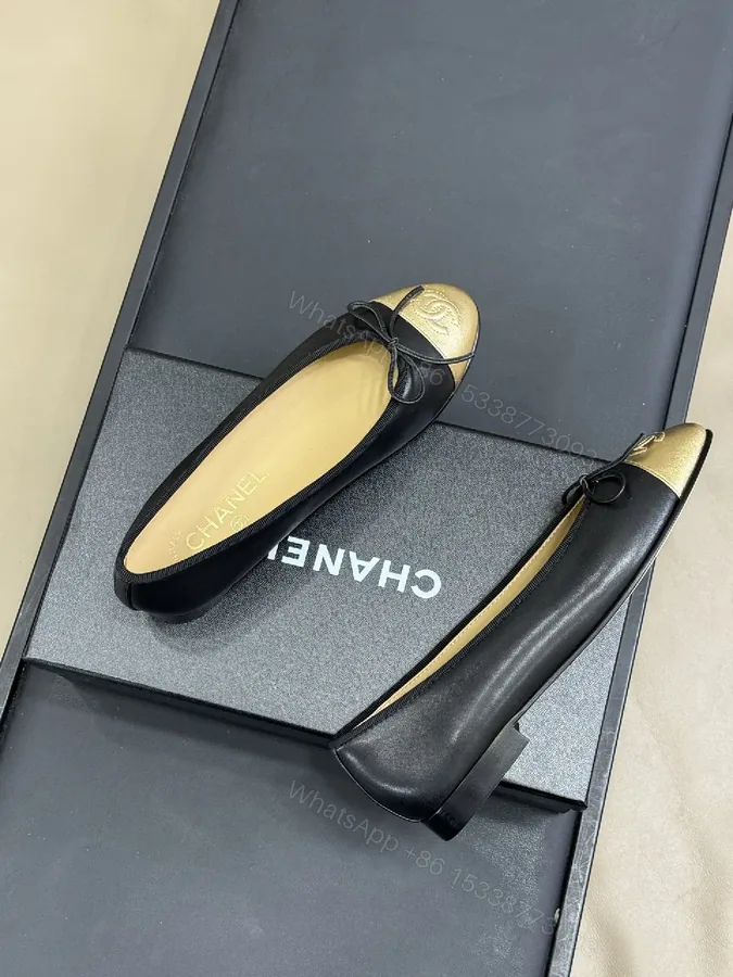 View 1 of Black Leather Ballet Flats with Gold Cap Toe, Sleek, Comfortable, Designer-Inspired