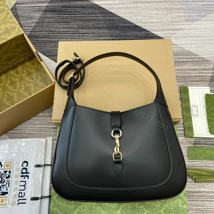 View 1 of JACKIE MEDIUM SHOULDER BAG 35 IN BLACK GOLD HARDWARE