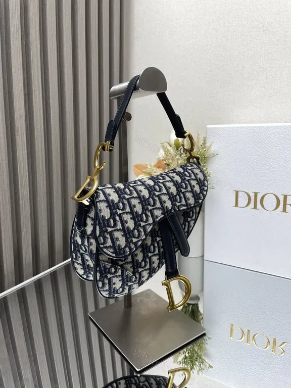 View 1 of Denim-Patterned Bag with Gold Hardware: Structured Luxury