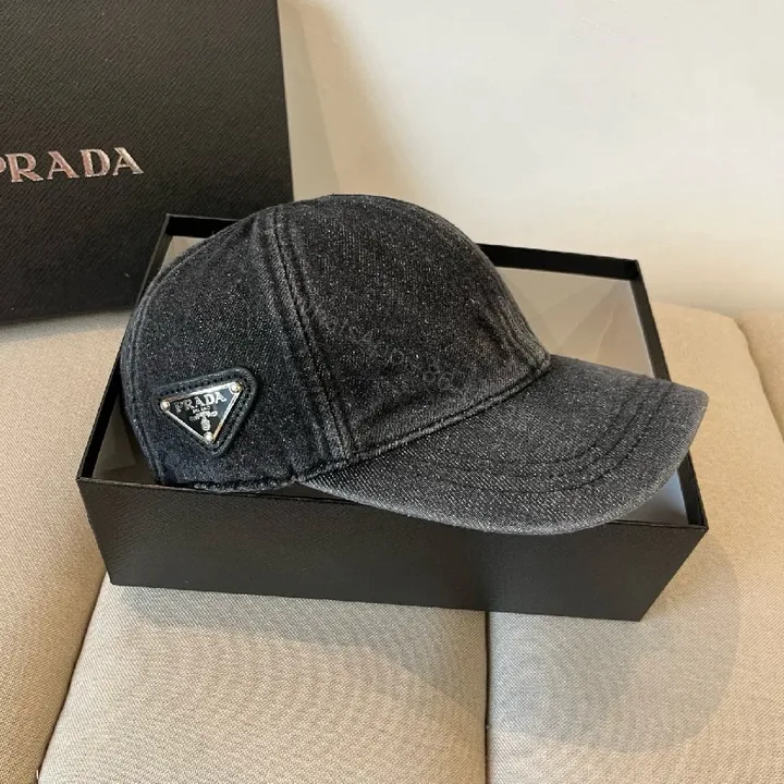 View 1 of Denim-Texture Cap with Subtle Prada Emblem, Casual Luxe Cap