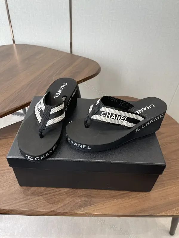 View 1 of Chic Black Foam Sandals with Signature Logo Straps