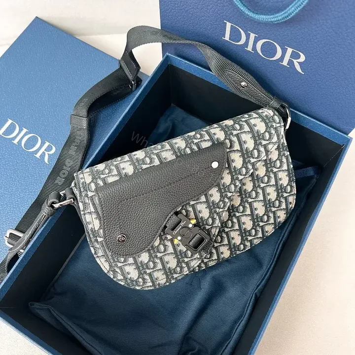 View 1 of Chic Monogram Crossbody Bag: Textured Leather, Modern Utility