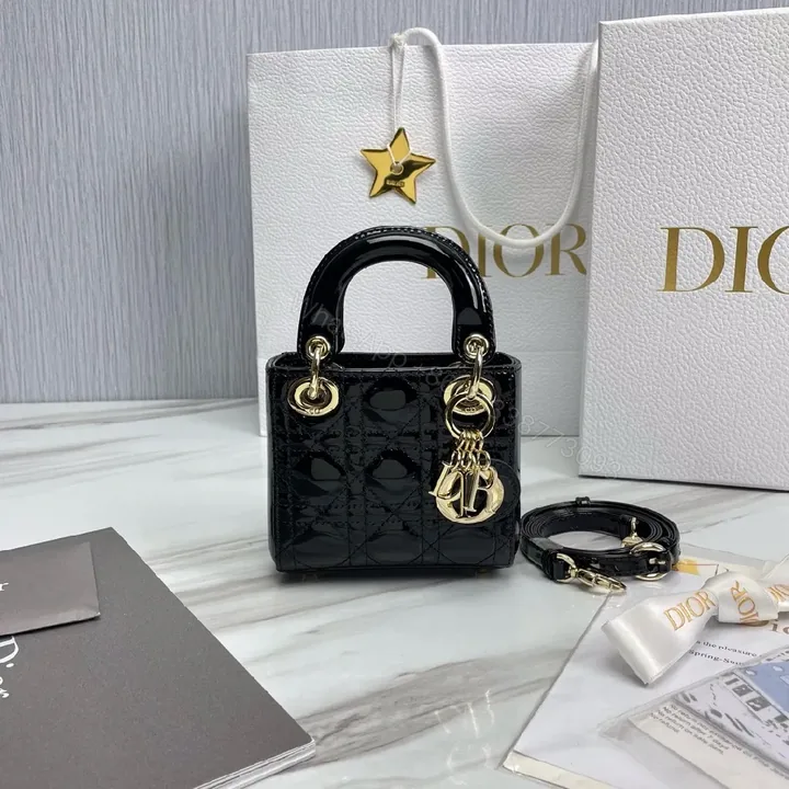 View 1 of Glossy Patent Top-Handle Bag – Gold Charm Accent, Mini Luxe