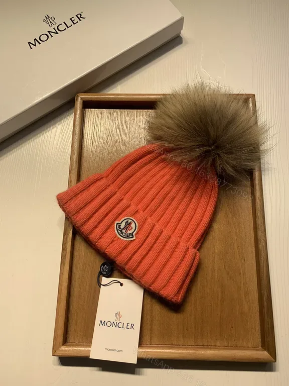 View 1 of Orange Knit Beanie with Fur Pom-Pom by Moncler - Luxe Wool Blend, Ribbed Style