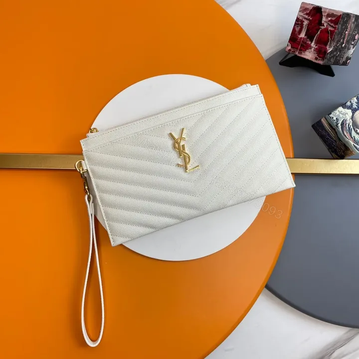 View 1 of YSL CASSANDRE MATTELASÈ LARGE ZIPPED POUCH IN GRAIN DE POUDRE EMBOSSED LEATHER
