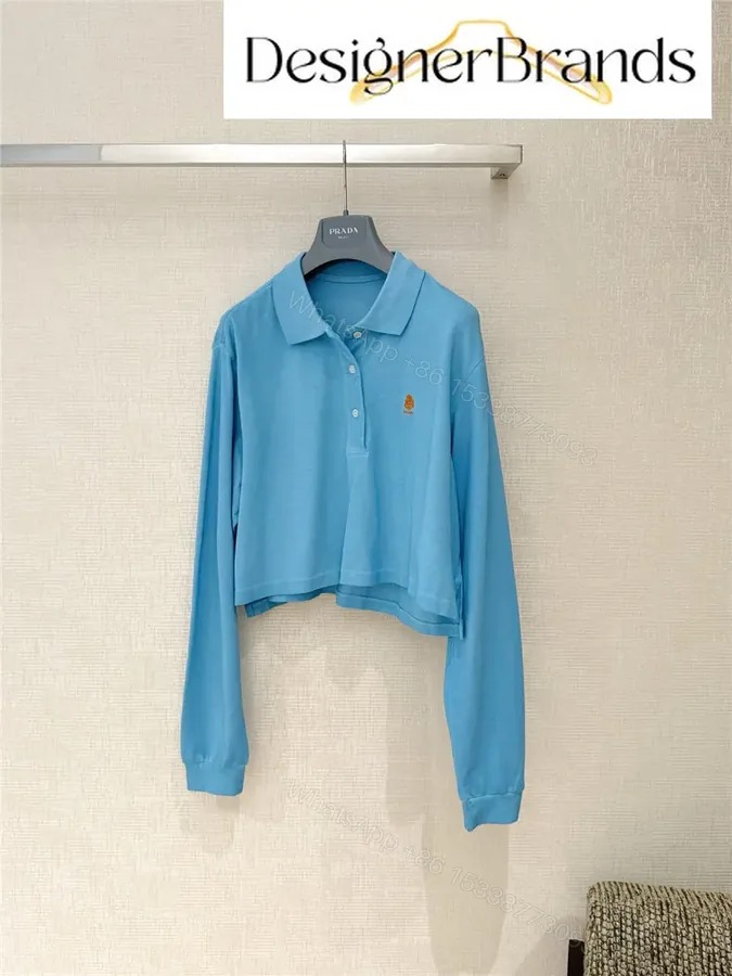 View 1 of Prada Light Blue Cropped Long-Sleeve Polo Shirt