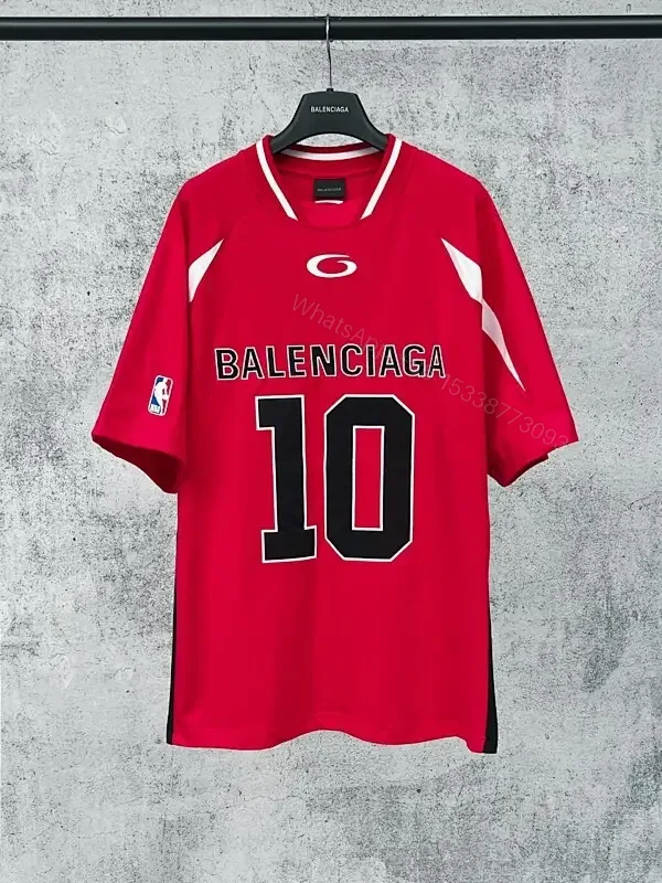 View 1 of Red Knit Jersey: Luxe Streetwear Crest Detail Top