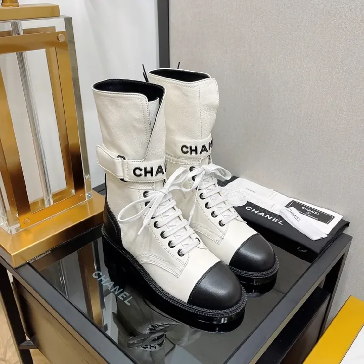 View 1 of Monochrome Leather Combat Boots with Signature Strap