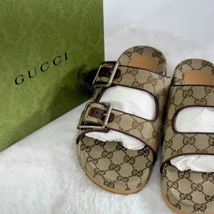 View 1 of GUCCI monogram canvas slide sandals