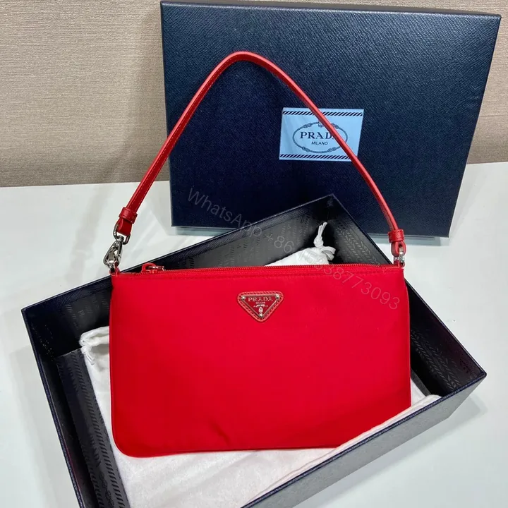 View 1 of SHOULDER BAG 24 WITH TRIANGLE LOGO IN PASSION RED RE-NYLON FABRIC