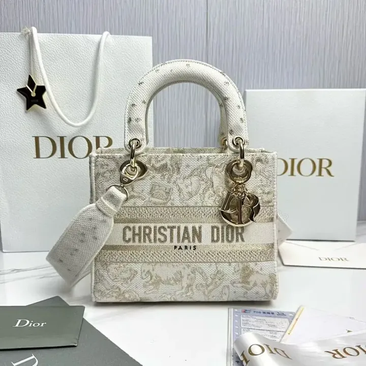 View 1 of Lux textured mini chamber bag: premium textile, compact luxury