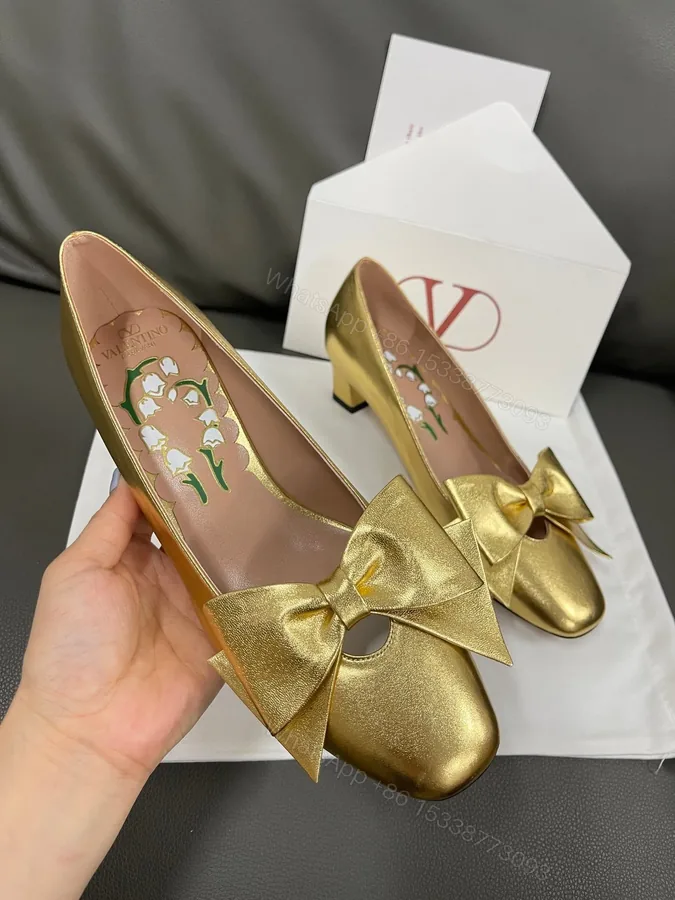 View 1 of Valentino Women Gold Leather Bow Detail Pumps