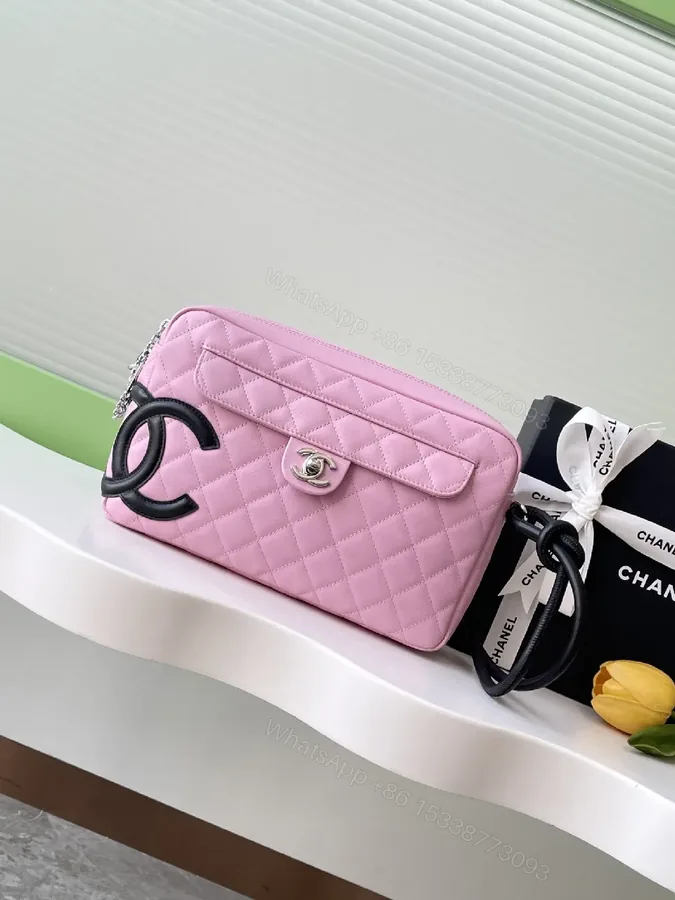 View 1 of Pink Quilted Handbag with Logo Hardware, Compact Classic Style