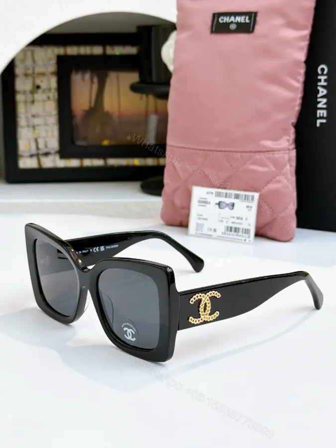 View 1 of Oversized Black Acetate Sunglasses with Gold Logo Details