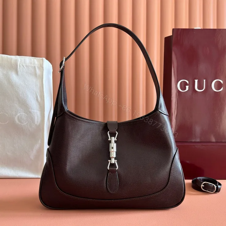 View 1 of GUCCI 26S JACKIE SLIM SHOULDER BAG 28 IN DARK BROWN CALFSKIN