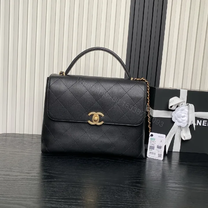 View 1 of Quilted Leather Handbag: Compact Luxury, Gold Hardware