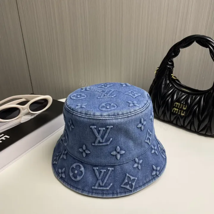 View 1 of Denim LV Monogram Bucket Hat â€” Modern Luxe, All-Day Style