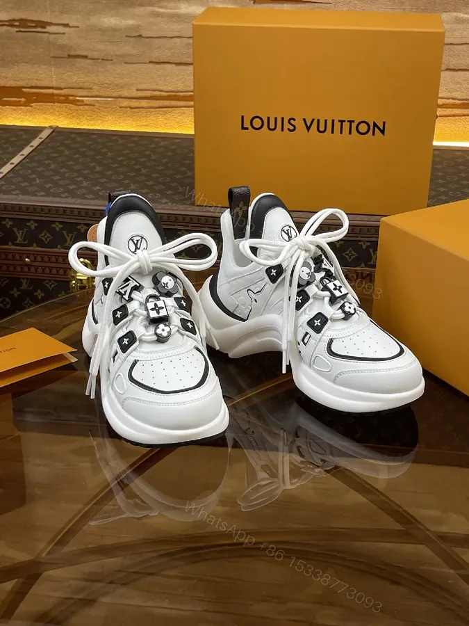 View 1 of Premium Leather High-Top Sneakers with LV Embellishments