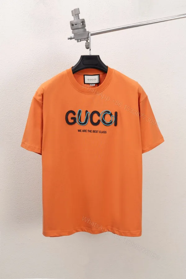 View 1 of Gucci高仿男款短袖T恤 刺繡字母設計橘色潮流百搭款