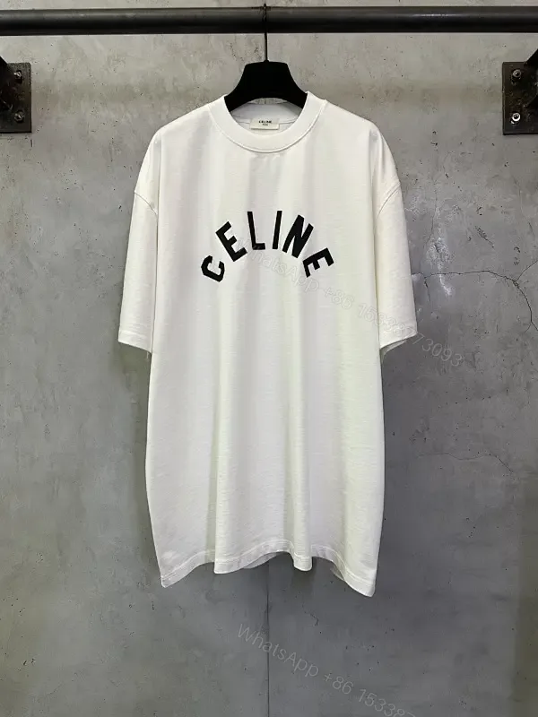 View 1 of Oversized White Cotton Tee with Bold CELINE Arch Graphic
