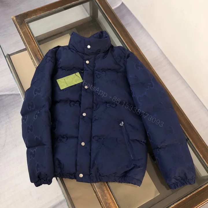 View 1 of Gucci原單海軍藍GG壓紋羽絨外套 經典立領款式