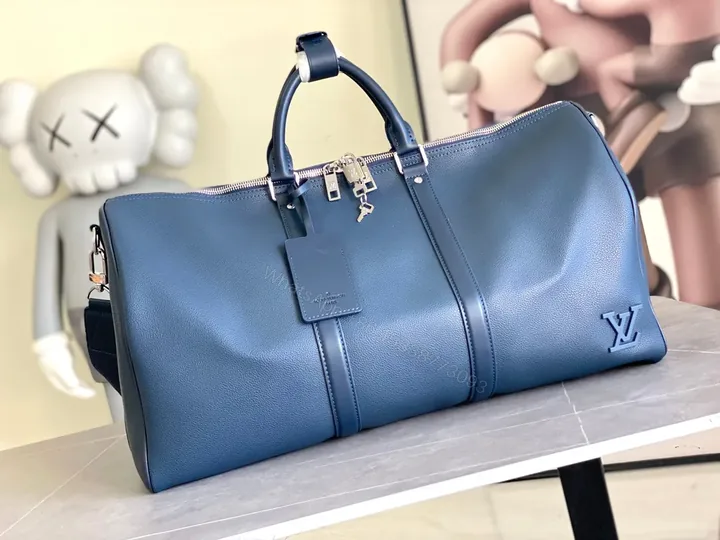 View 1 of Bold Blue Duffle Bag: Pebble Leather-Inspired Luxury Carryall