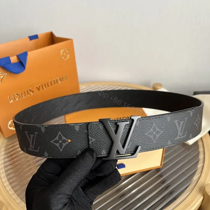 View 1 of Black Pebbled Leather Belt with LV Logo Buckle