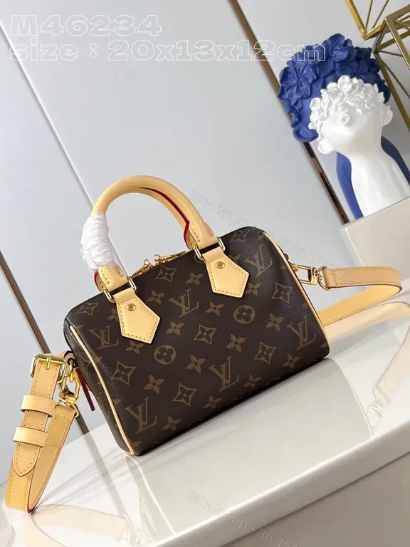 View 1 of Monogram Luxe Compact Handbag: Gold Hardware, Leather Trim