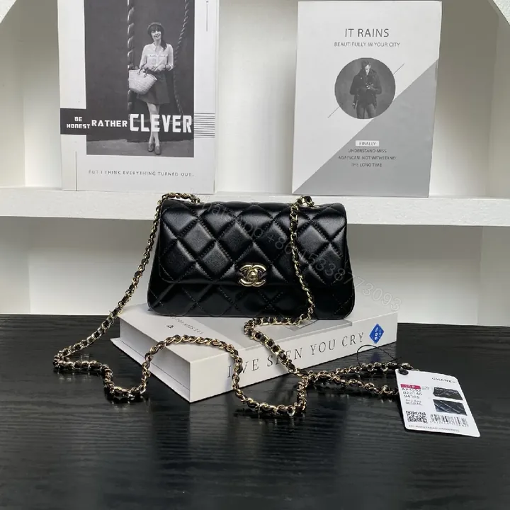 View 1 of Quilted Black Flap Bag with Gold Chain Strap, Compact, Elegant