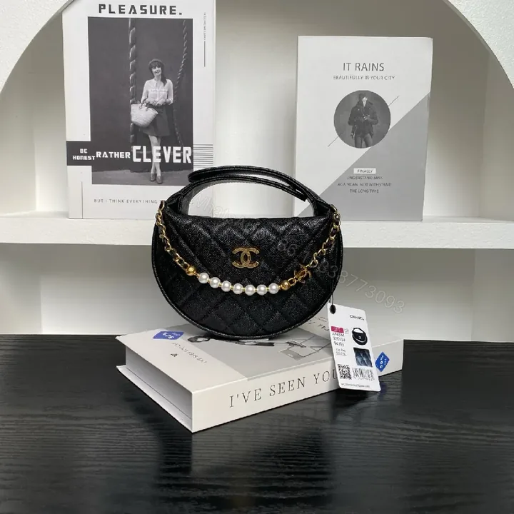 View 1 of Compact Quilted Black Mini Bag with Pearl Chain