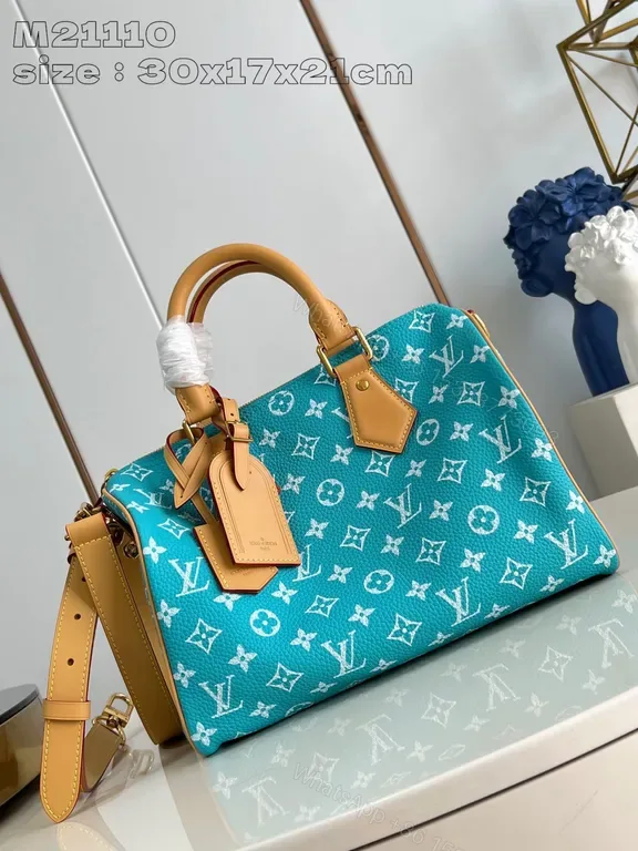 View 1 of Turquoise Monogram Satchel â€“ Canvas + Leather, Structured, All-Day Versatility